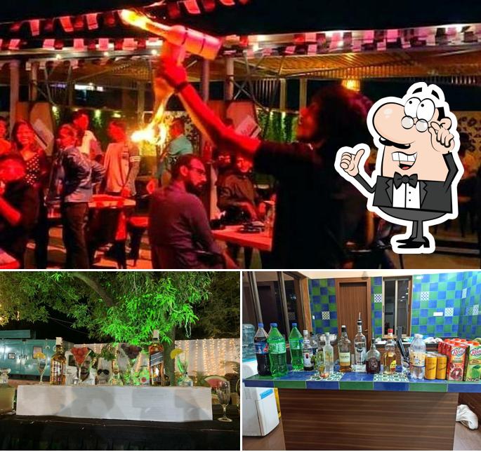 Take a seat at one of the tables at Shiv Bartender