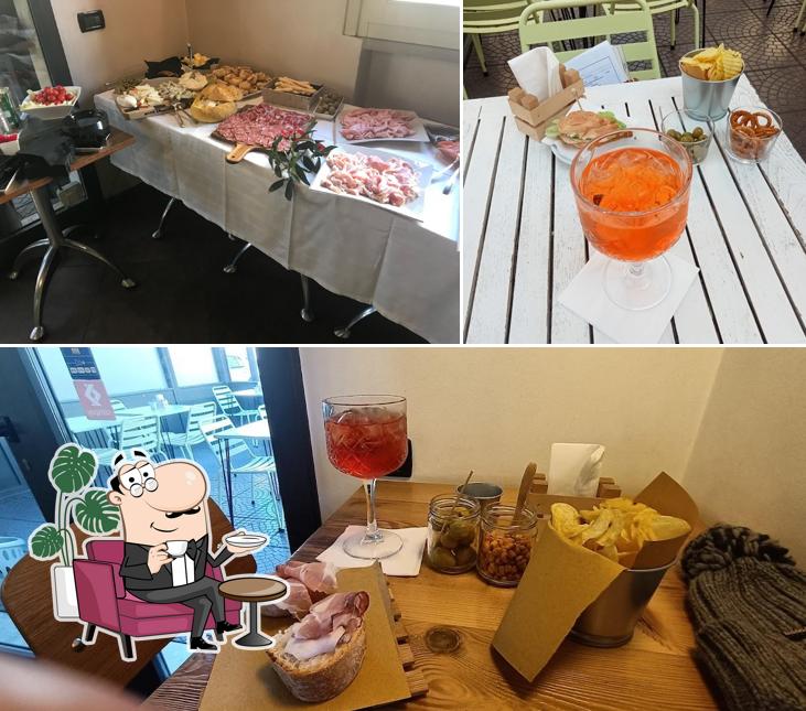 Guarda la foto che mostra la interni e cibo di Dandy's Contemporary Café