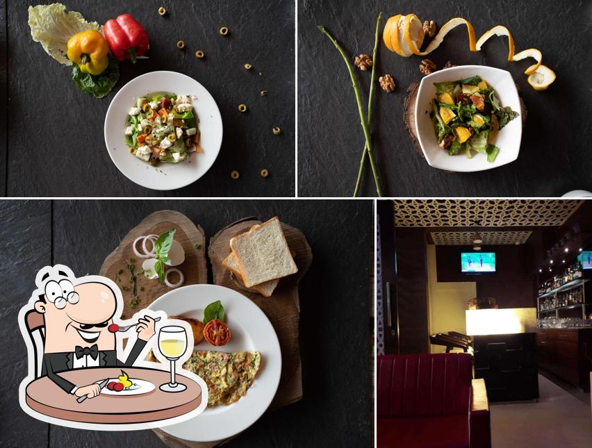 This is the photo depicting food and interior at Rivaaz @ The Fern Residency