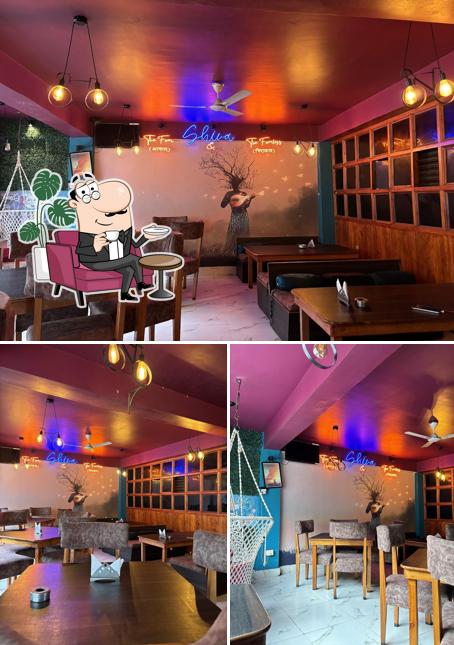 Take a seat at one of the tables at Food Mood