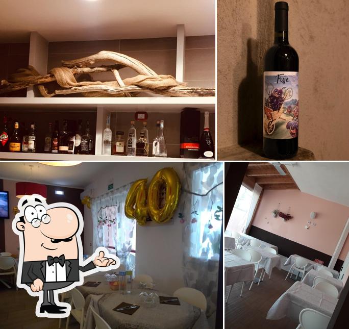 Questa è la foto che raffigura la interni e bevanda di ''POMPOSA'' ristorante pizzeria