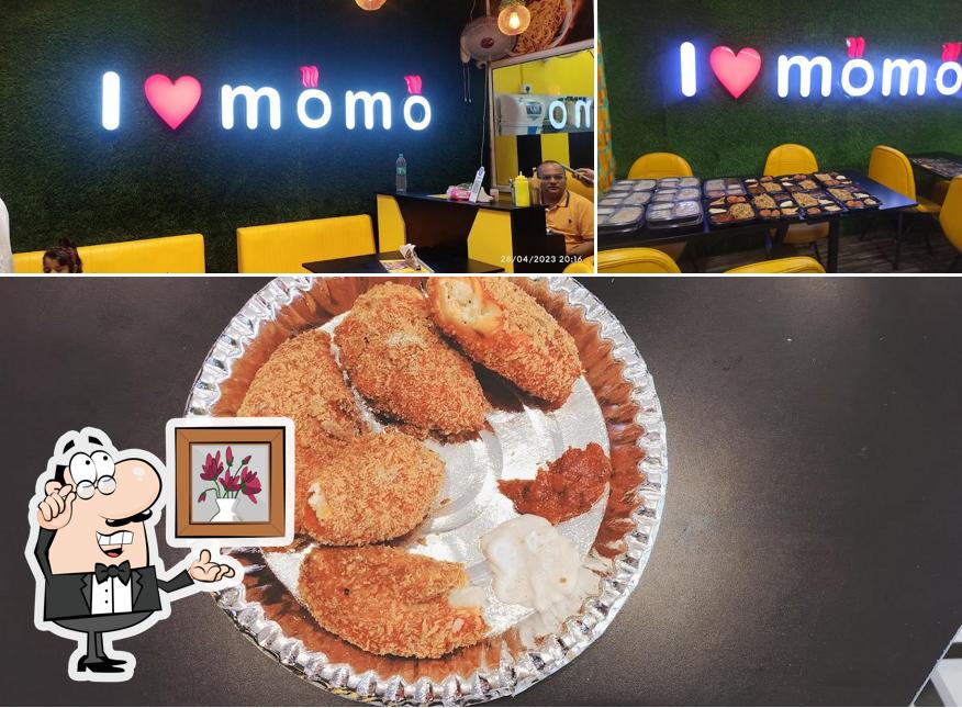 Take a look at the picture displaying interior and food at Momomia Love in Every Bite - Best Momos & Chinese Cuisine in Bhiwadi