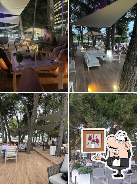 Dai un'occhiata agli interni di Pino Bar