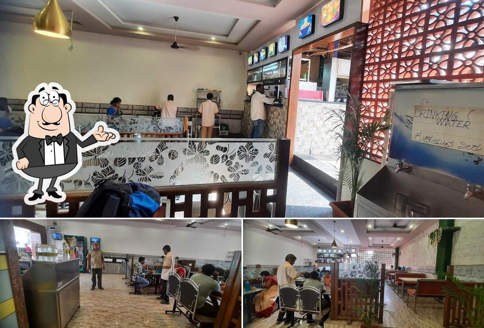 Take a seat at one of the tables at Ellora Family Restaurant