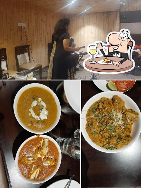 Take a look at the photo displaying food and interior at MADHUR