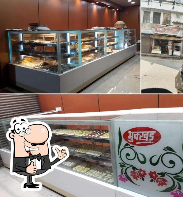 Look at the photo of Bhukkad Sweets