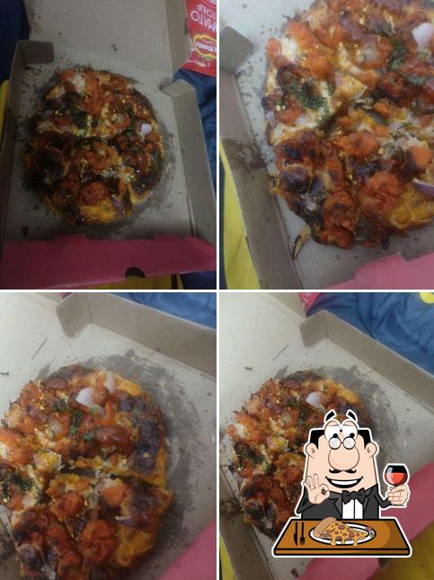 Get pizza at Chill Out Ice Cream & Pizza