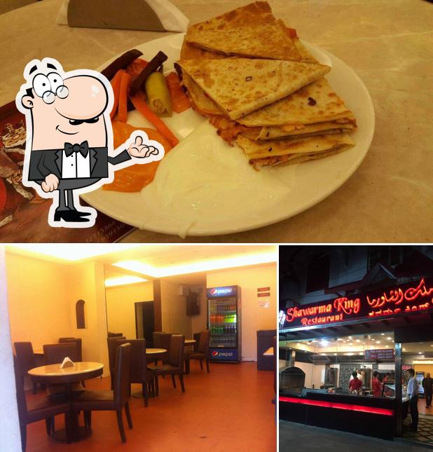 The image of King biriyani hotel’s interior and food