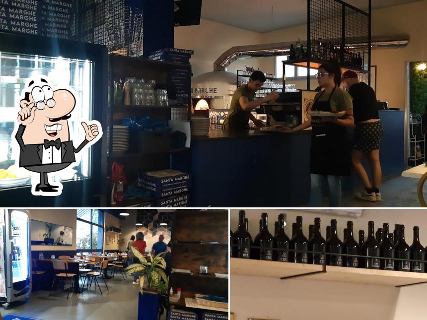 Dai un'occhiata agli interni di Pizzeria Santa Marghe