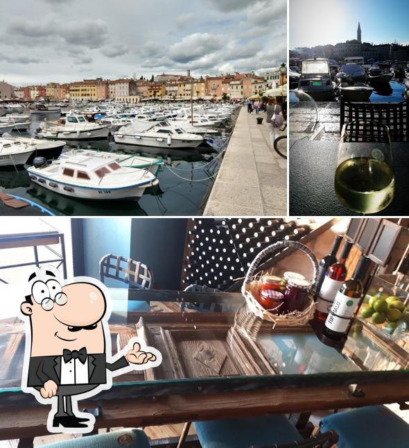 Siediti a un tavolo di San Tommaso Gourmet and wine