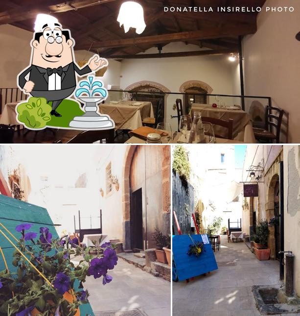 Dai un’occhiata alla foto che mostra la esterno e tavolo da pranzo di Locanda Scorfano Rosso