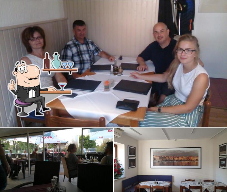 Siediti a un tavolo di Dario Restaurant Pizzeria