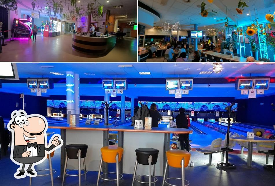 Tra le diverse cose da Arhena + Bowling, Pizzeria & Snackeria si possono trovare la interni e cibo