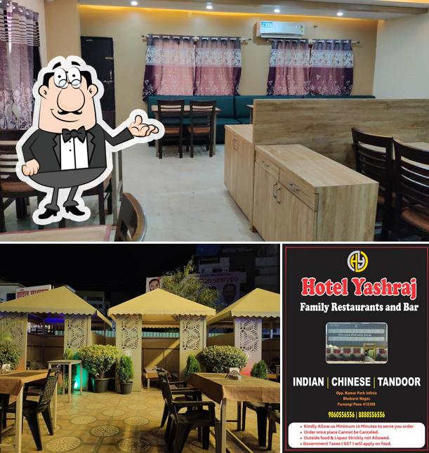 Take a seat at one of the tables at Hotel Yashraj Family Restaurant and Bar