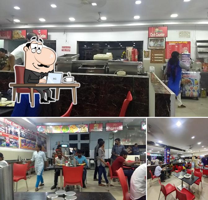 Take a seat at one of the tables at Sudarshini Food Court