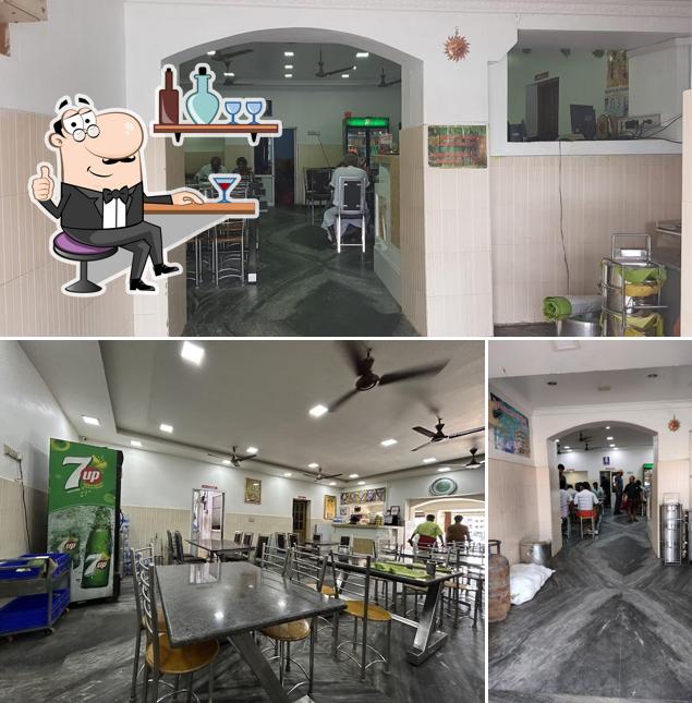 Take a seat at one of the tables at Maruthi Pure Vegetarian