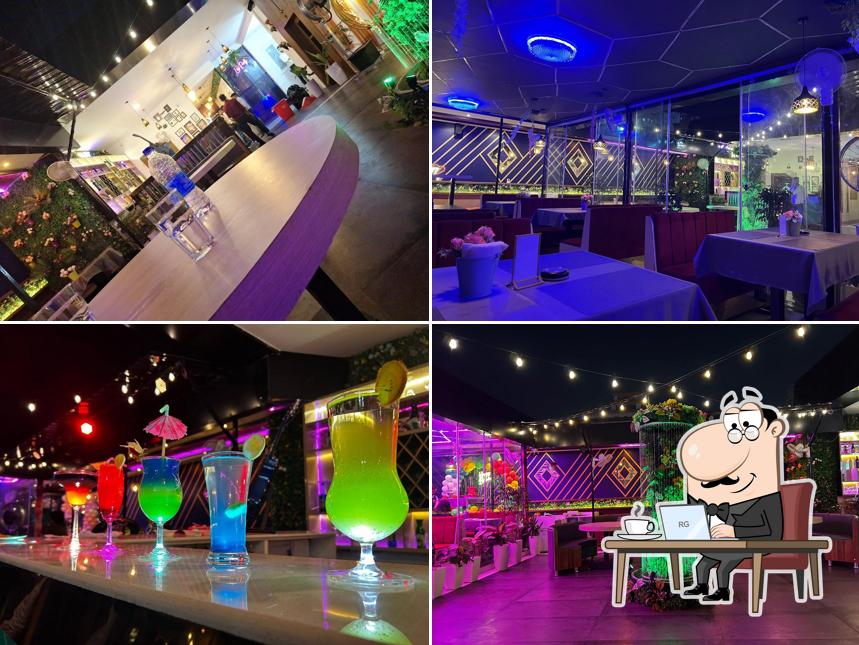 Take a seat at one of the tables at The Atmos 3