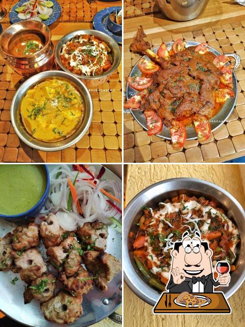 At Takshila - Hotel Chanakya, you can try pizza