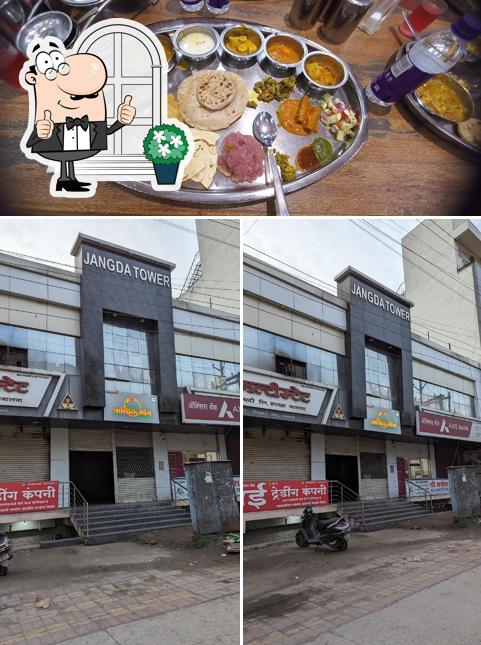 Among different things one can find exterior and food at Dadich's Satvik Bhoj