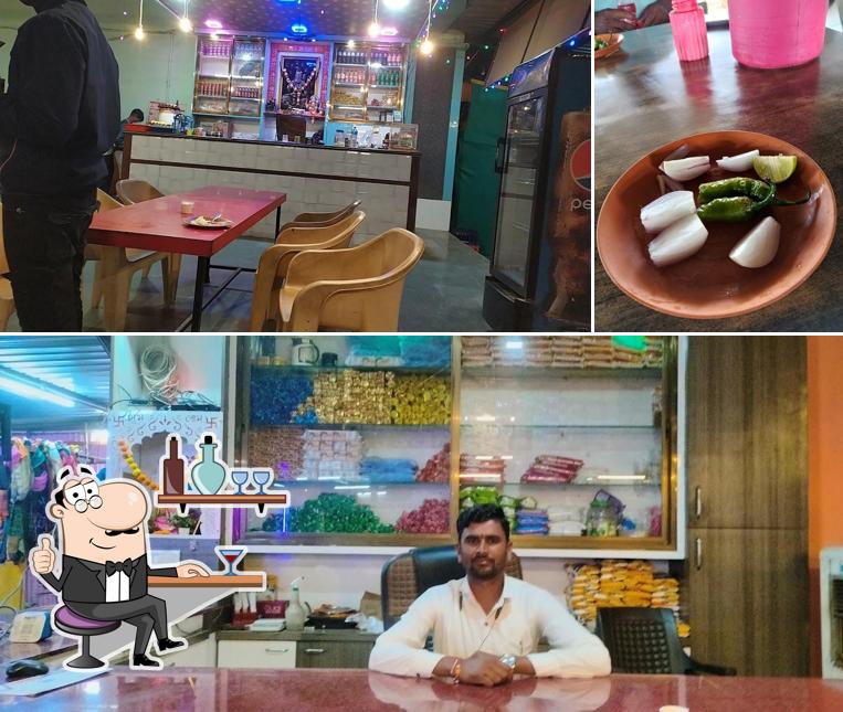 The photo of interior and food at Hotel Sahyadri & Family Restaurant