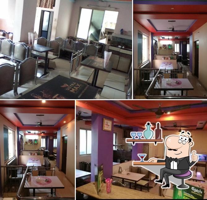 Take a seat at one of the tables at kanak restaurant & bar