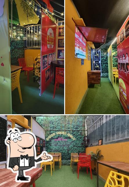 Take a seat at one of the tables at Imo's Burger Affair