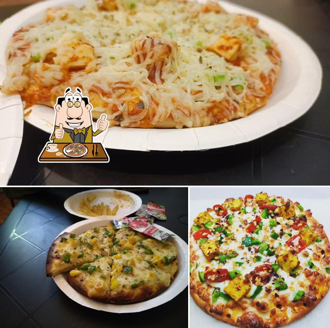 Pick pizza at Cafe Creme Bajajnagar