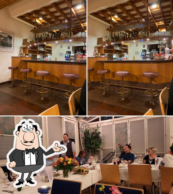 Siediti a un tavolo di Restaurant Eule