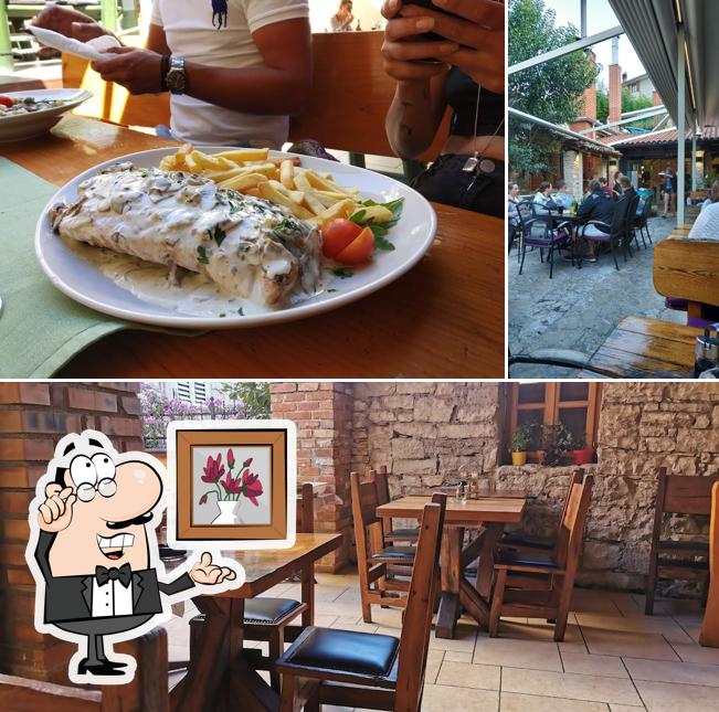 Siediti a un tavolo di Pizzeria Jupiter