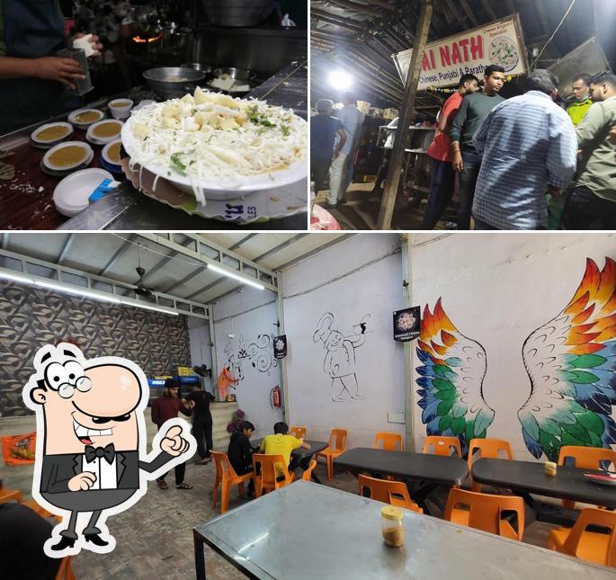 Take a seat at one of the tables at Sainath Cheese Anguri