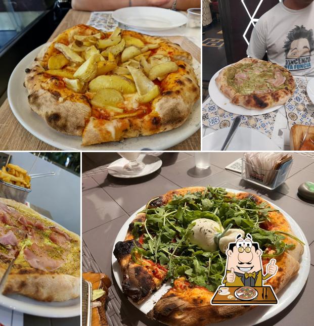 A Caffè Ariosto, puoi ordinare una bella pizza