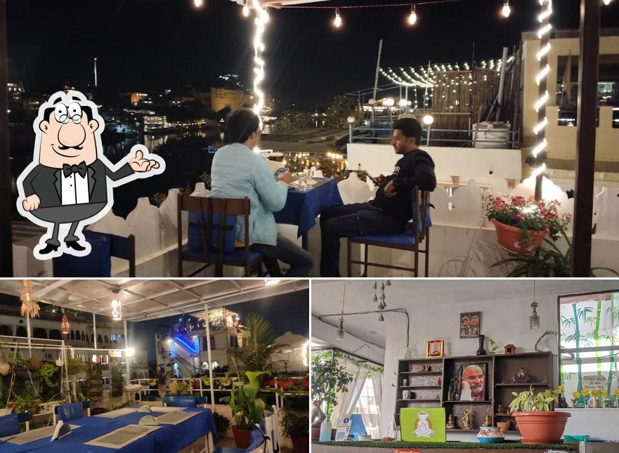 Take a seat at one of the tables at Yummy Yoga best Rooftop Restaurant