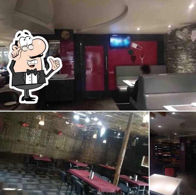 This is the photo displaying interior and food at ATM Restaurant & Bar