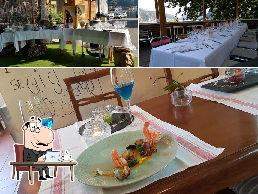 Siediti a un tavolo di Antica Osteria del Porto