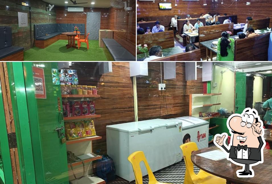 Take a seat at one of the tables at MANA JAI BHARAT FAMILY RESTAURANT