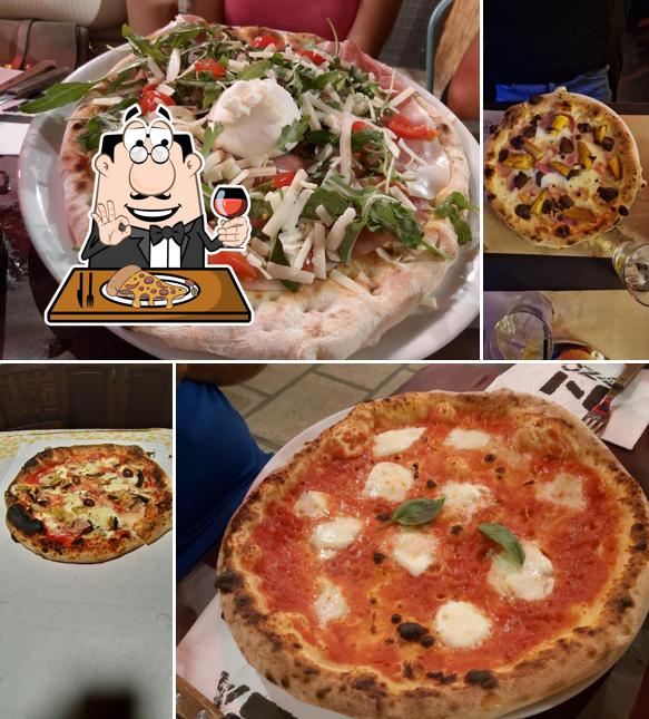 Prenditi una pizza a LA ZONA Pub Radical beer