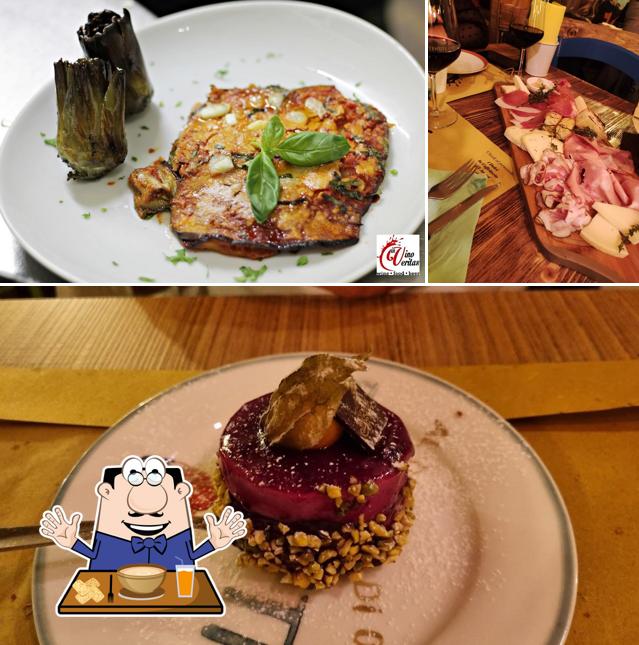 Questa è la foto che mostra la cibo e tavolo da pranzo di IN VINO VERITAS