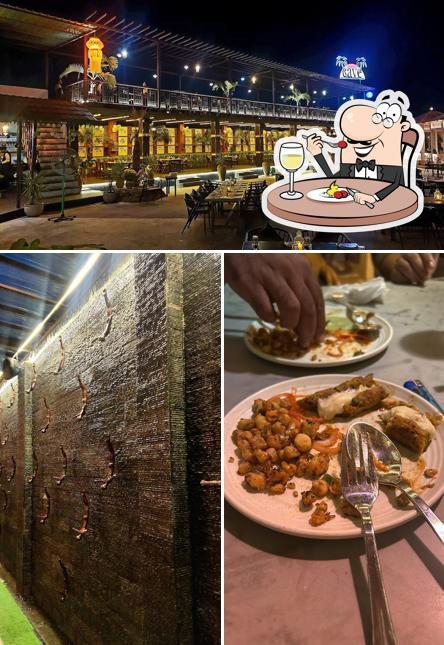This is the photo showing food and interior at Cave Dine In