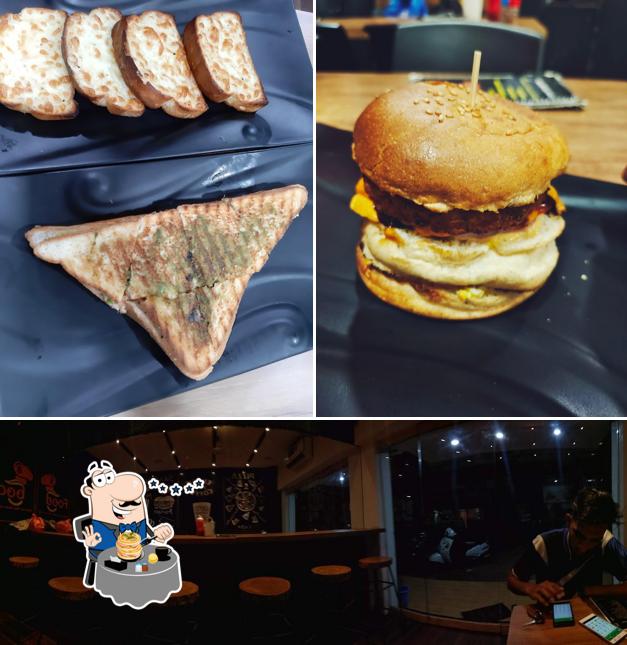 Check out the photo displaying food and bar counter at Sarju food