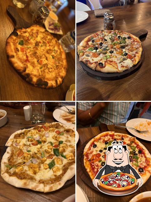 Order pizza at Basil Bakehouse (Rooftop Restaurant & Cafe)