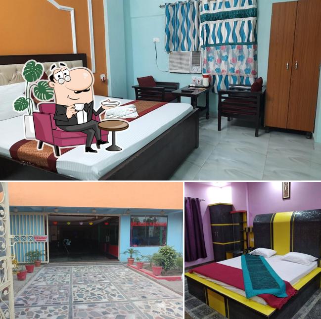 Take a seat at one of the tables at Hotel Ralson & Raj Restaurant