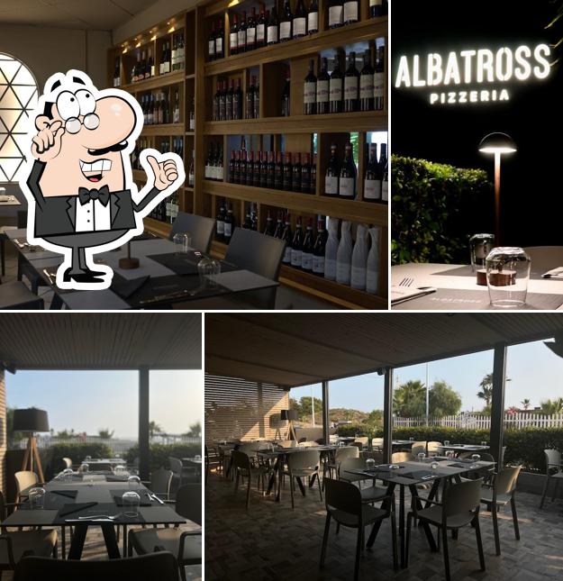 Dai un'occhiata agli interni di Albatross Pizzeria