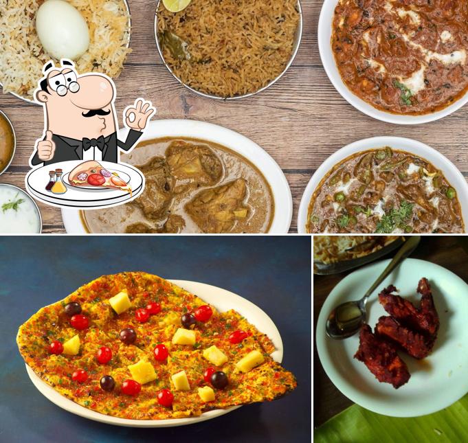 Pick pizza at Nandhini Deluxe
