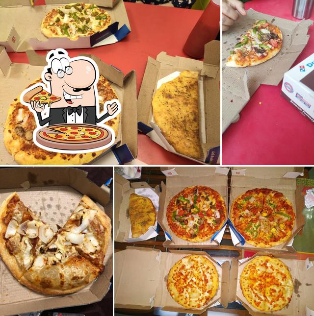 Pick pizza at Domino's Pizza 4D Square Mall, Ahmedabad
