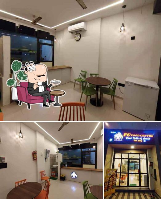 Take a seat at one of the tables at FC FOOD CENTRE