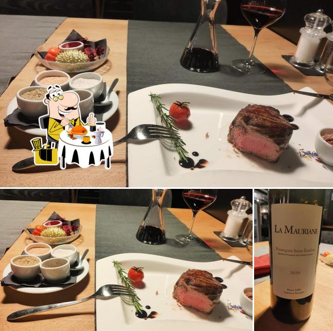 Dai un’occhiata alla immagine che raffigura la cibo e vino di The Flame Zug