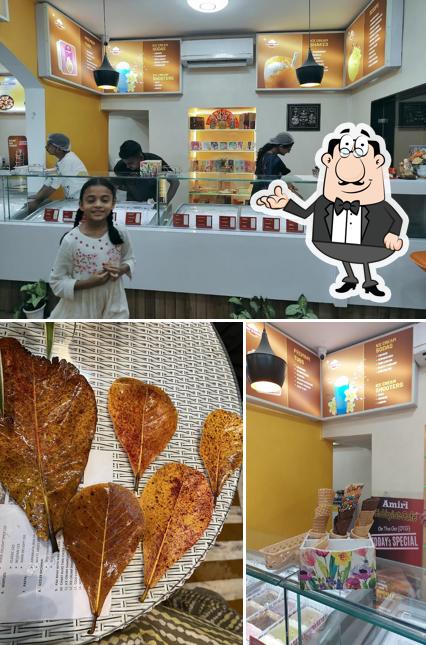 This is the photo depicting interior and food at Amiri Cafe OTG (On The go)