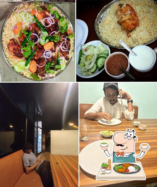 The photo of food and interior at Al Raydan Hotel