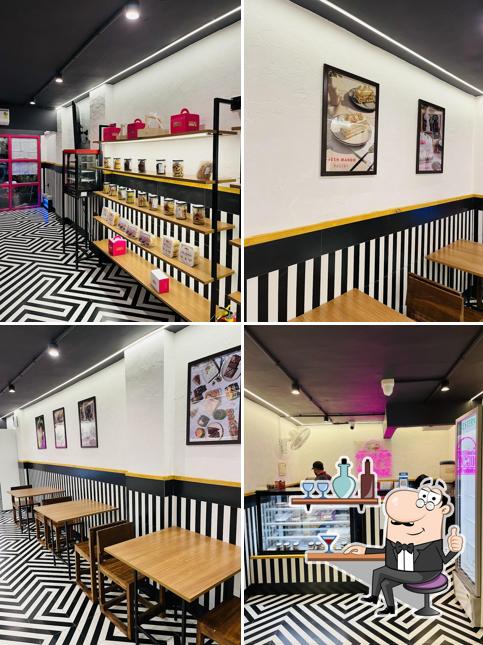 The interior of Baked By Nini's - Memnagar