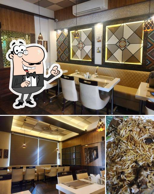 This is the image showing interior and food at Sri Kuber Family Restaurant